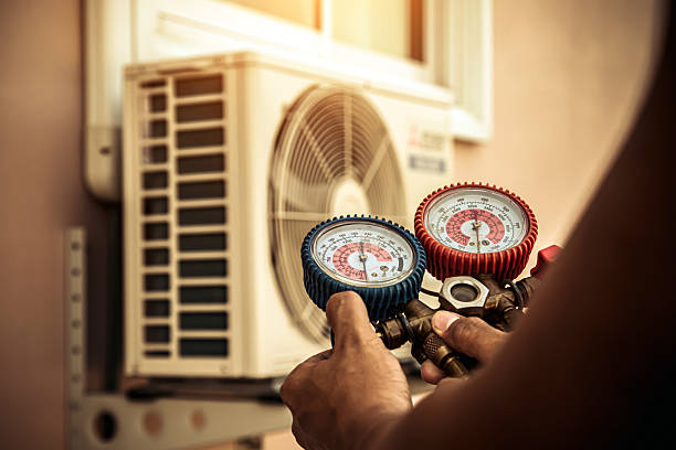 Professional Air Conditioning Service technician working in Watervliet, MI